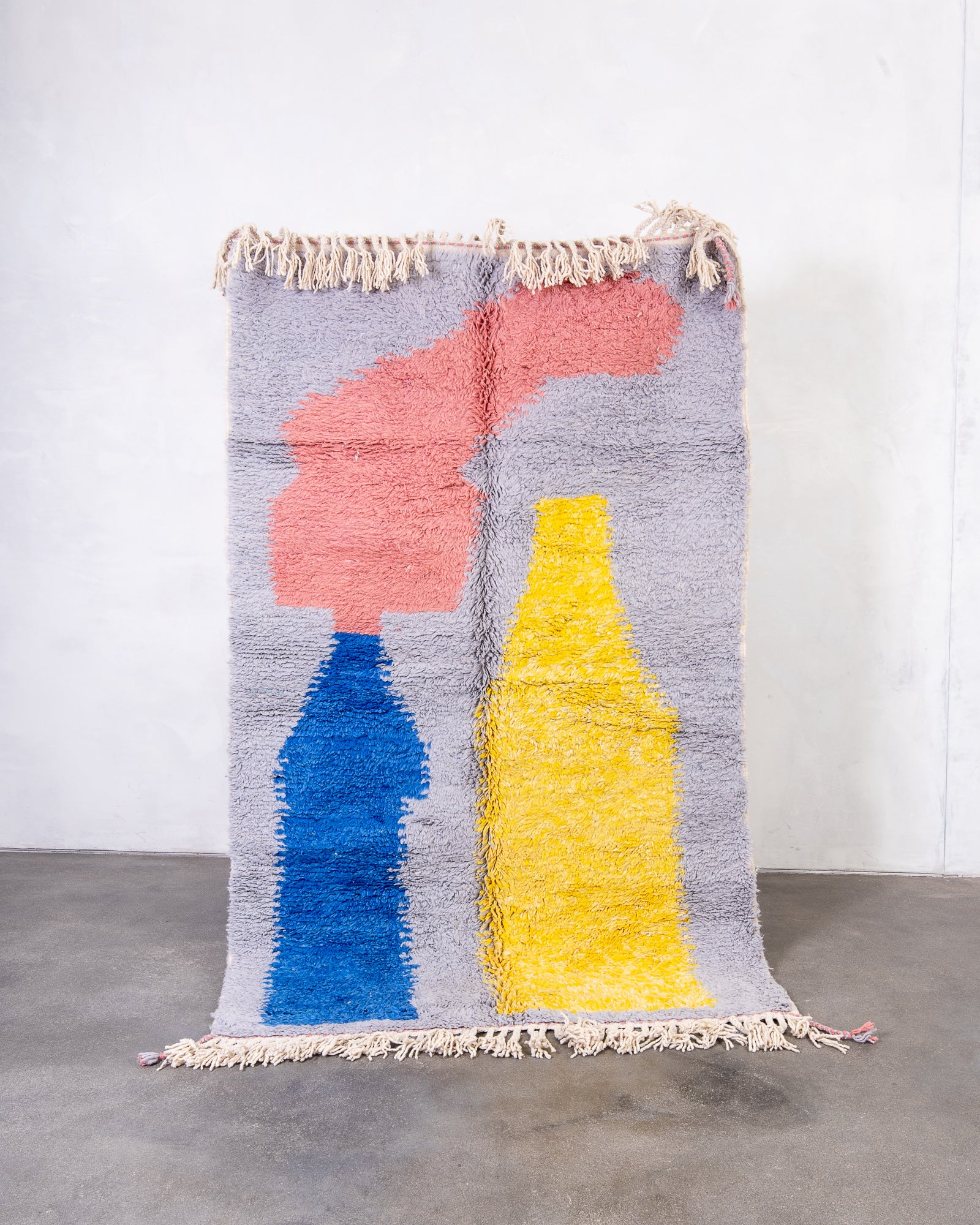 Modern, designer, handcrafted Berber rug from Morocco. Beniourain carpet with beautiful colours and patterns and fluffy wool texture.